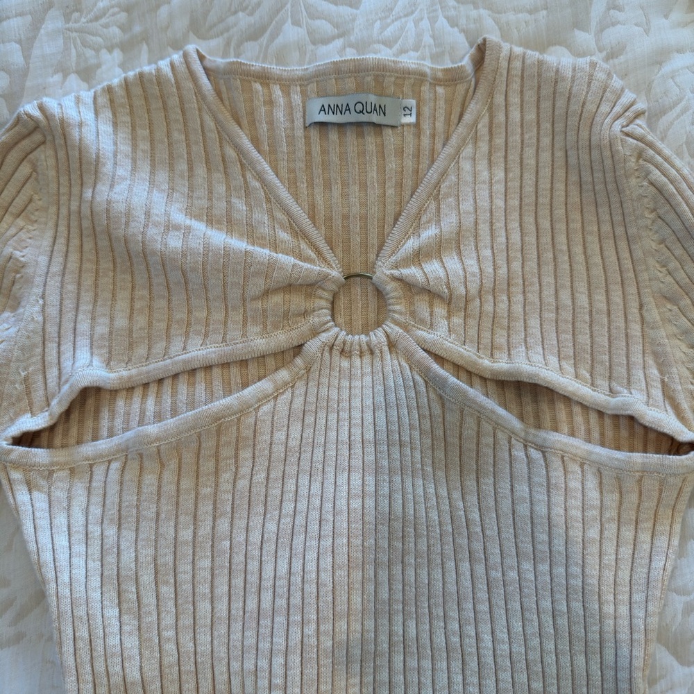 Anna Quan Light Beige Ribbed Knit Blouse with Cut Outs.